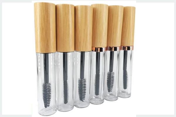 Mascara brush bottle with bamboo and wood cap