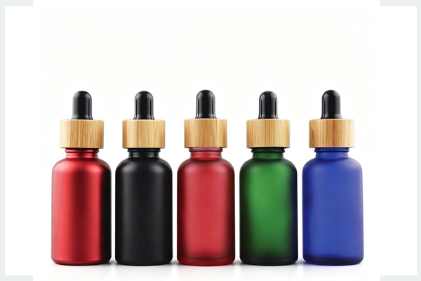 Bamboo cap frosted dropper bottle
