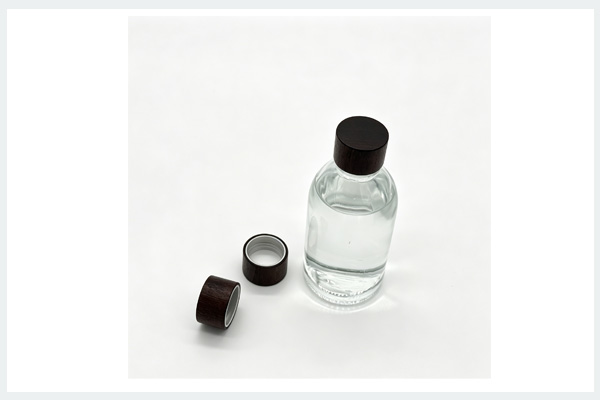 Wooden-clad aluminum cap glass bottle